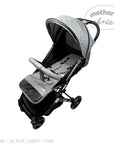 Gray baby stroller with quilted design on a white background