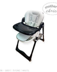 Baby high chair with tray on a white background, branded 'Mother's Choice'.