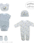 Collection of baby clothing items including a onesie, bodysuit, hat, and booties with 'Mother's Choice' branding.
