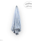 Blue baby blanket with white patterns on a white background, featuring 'mother's choice' branding.