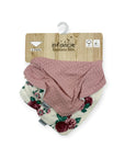 Two baby bandana bibs on a wooden hook with 'infancie' branding.