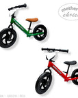 Two balance bikes, one green and one red, with 'Mother's Choice' branding on a white background.