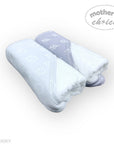 Two light blue towels with a subtle pattern on a white background, branded 'Mother's Choice'.