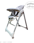 Gray high chair with 'Mother's Choice' branding on a white background