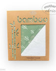 Bamboo hooded towel packaging with a green towel inside on a white background
