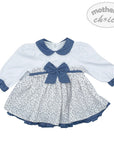 White dress with blue floral pattern and collar on a white background, featuring 'mother's choice' branding.