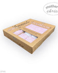 Bamboo baby gift set packaging with pink items on a white background