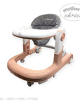 Baby walker with pink and stone design on a white background, featuring 'Mother's Choice' branding.