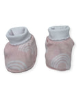 Pair of baby socks with gray cuffs and pink sole with white patterns on a white background