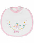 White baby bib with pink trim and floral embroidery on a white background