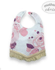 Floral patterned bib with fringes on a white background, branded 'Mother's Choice'.