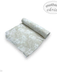 Floral-patterned fabric roll with 'mother's choice' branding on a white background