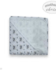 Folded baby blanket with animal pattern on a white background, branded 'Mother's Choice'.