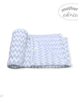 Folded baby blanket with a pattern on a white background, featuring 'mother's choice' branding.