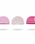 Three pink baby hats with different patterns on a white background