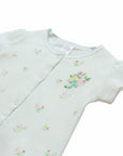 Baby romper with floral embroidery on a white background