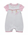 Baby romper with pink sleeves and trim on a white background