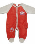 Red baby onesie with beige sleeves and feet on a white background