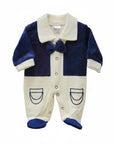 Baby romper with navy blue and white design on a white background