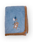 Blue baby blanket with teddy bear design on a white background