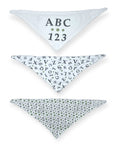 Three triangular bibs with different patterns on a white background