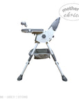 Gray high chair with 'Mother's Choice' branding on a white background