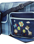 Blue diaper bag with animal designs and a matching blanket on a white background