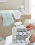 Stork And Baby 4 pack baby washcloths in white and grey with paw prints, soft and absorbent for gentle baby care.