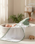 Stork And Baby Mother's Choice sage green bamboo hooded towel with leaf print, 75x75cm.
