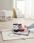 Stork And Baby 5 piece baby bib and sock set with mustache print and striped socks. Soft cotton for sensitive skin.