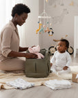 Stork And Baby Earth tone PU upper baby bottle warmer, insulated for travel and outings.