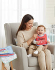 Stork And Baby 4 pack embroidered bibs, featuring a blue bib with 'Just Plane Cute' and an airplane, and a red bib with 'Super Cute'. Soft fabric, dribble proof.