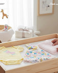 Stork and Baby Girls Butterfly 3-piece set: yellow bodysuit with butterfly graphic, floral shorts, and butterfly socks. Soft cotton.