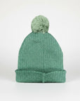 Stork And Baby green knit baby beanie with a pom pom. Cozy and soft for winter.