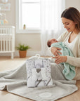 Stork And Baby grey elephant 3-piece hooded towel and 3-piece facecloth set made of soft cotton.