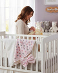 Stork And Baby pink and white hooded towel and facecloth set with heart pattern and bow detail