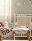 Stork And Baby pack of 3 infant bibs with colorful cartoon animal prints and lace trim.