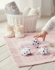 Stork And Baby infant girls hair accessory set featuring white flower clips and headband with black polka dots