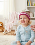 Stork And Baby infants winter hat in brown with pink and white stripes, featuring a small embroidered butterfly.