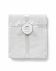 Stork And Baby Mothers Choice white 100% acrylic baby shawl with textured knit pattern and elegant ribbon gift wrap.