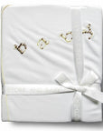 Stork And Baby Mothers Choice beige 100% cotton jersey baby wrap folded with a ribbon and embroidered baby text