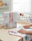 Stork And Baby Mothers Choice 3-pack pink dinosaur flannel baby receiver blankets for swaddling and nursery comfort.