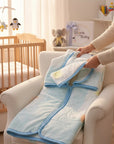 Stork And Baby Mothers Choice infant baby sac in soft blue and white with a cozy zip-up design for nursery comfort.
