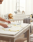 Stork And Baby Mothers Choice 3 bodysuits, mittens, and hat set in grey and yellow. Soft cotton for newborn comfort.