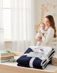 Stork And Baby navy sailor hooded towel made of 100% cotton with embroidered details. Soft and absorbent for babies.