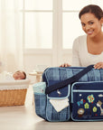 Stork And Baby Mothers Choice Navy Nappy Bag Fun with embroidered animals and trees, spacious compartments, and adjustable strap.