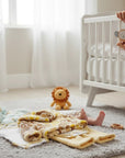 Stork And Baby 3 piece neutral hooded baby outfit set with giraffe print and soft yellow terry cloth.