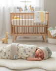 Stork And Baby striped green and beige knit baby hat with elephant print swaddle
