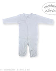 Stork And Baby white long-sleeve babygrow with snap closures and footies. Soft, breathable cotton for everyday comfort.