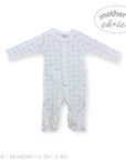 Stork And Baby white babygrow with all-over grey cat print and snap closures. Long sleeves and footies.